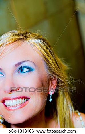 Portrait close-up of woman smiling View Large Photo Image Stock Photograph - Portrait close-up of woman smiling. Fotosearch