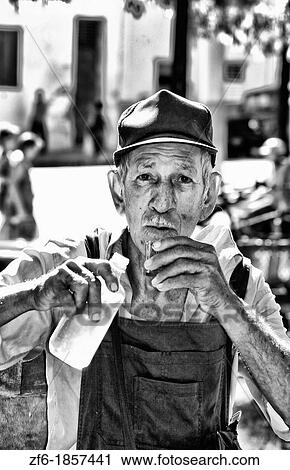 Portrait closeup of old man drinking in center park of Cienfuegos Cuba View Large Photo Image Stock Image - Portrait closeup of old man drinking in center park of Cienfuegos Cuba. Fotosearch