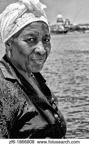 Portrait colorful woman in park in Havana Cuba Habana View Large Photo Image Stock Photo - Portrait colorful woman in park in Havana Cuba Habana. Fotosearch