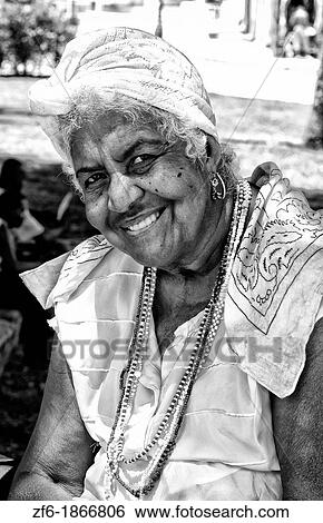 Portrait colorful woman in park in Havana Cuba Habana View Large Photo Image Stock Photograph - Portrait colorful woman in park in Havana Cuba Habana. Fotosearch