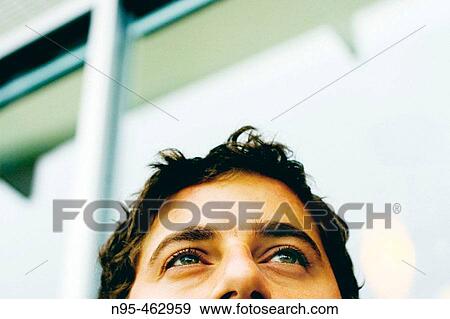 Portrait. Man looking up. View Large Photo Image Stock Photo - Portrait. Man looking up.. Fotosearch