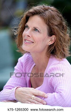 Portrait middle age woman View Large Photo Image Stock Image - Portrait middle age woman. Fotosearch