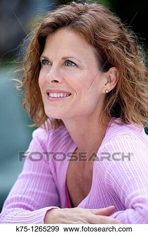 Stock Photo - Portrait middle age woman. Fotosearch