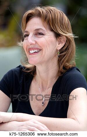 Portrait middle age woman View Large Photo Image Stock Photograph - Portrait middle age woman. Fotosearch