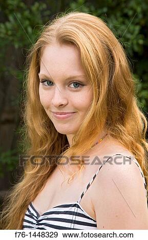 Portrait Of 17 Year Old Teenage Girl With Long Strawberry Blonde