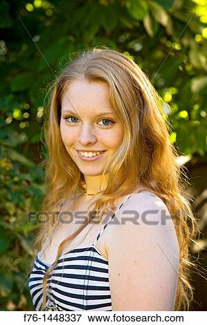 Portrait Of 17 Year Old Teenage Girl With Long Strawberry Blonde
