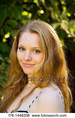 Portrait of 17 year old teenage girl with long strawberry blonde hair View Large Photo Image Stock Photo - Portrait of 17 year old teenage girl with long strawberry blonde hair. Fotosearch