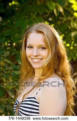 Portrait Of 17 Year Old Teenage Girl With Long Strawberry Blonde