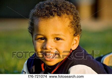 Portrait of 2 year old boy of caucasian and african ancestory View Large Photo Image Picture - Portrait of 2 year old boy of caucasian and african ancestory. Fotosearch