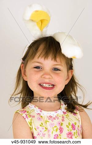 Portrait of 3 year old girl with bunny ears View Large Photo Image Stock Photo - Portrait of 3 year old girl with bunny ears. Fotosearch