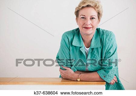 Portrait of 50-60 caucasian woman View Large Photo Image Picture - Portrait of 50-60 caucasian woman. Fotosearch