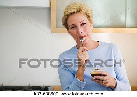 Stock Image - Portrait of 50-60 caucasian woman. Fotosearch