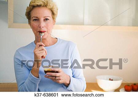 Stock Image - Portrait of 50-60 caucasian woman. Fotosearch