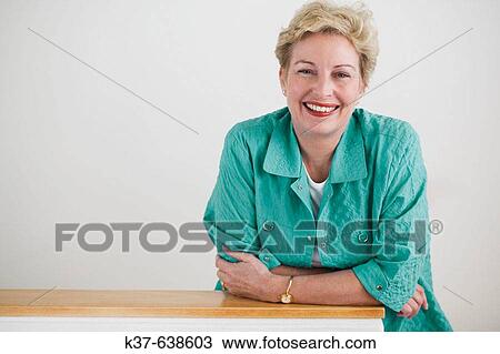 Portrait of 50-60 caucasian woman View Large Photo Image Stock Image - Portrait of 50-60 caucasian woman. Fotosearch