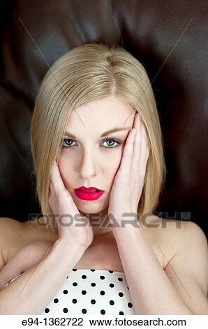 Portrait of a 19 year old blond woman looking directly at camera View Large Photo Image Stock Image - Portrait of a 19 year old blond woman looking directly at camera. Fotosearch