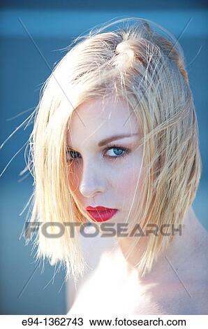 Portrait of a 19 year old blond woman looking directly at camera View Large Photo Image Stock Image - Portrait of a 19 year old blond woman looking directly at camera. Fotosearch