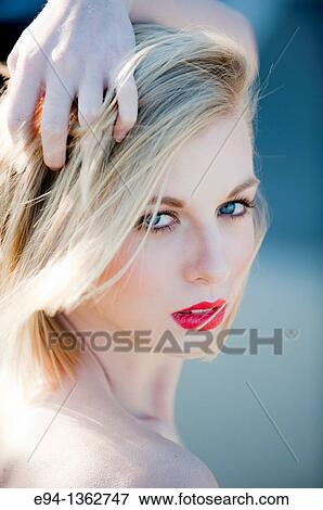 Portrait of a 19 year old blond woman looking directly at camera View Large Photo Image Stock Photo - Portrait of a 19 year old blond woman looking directly at camera. Fotosearch