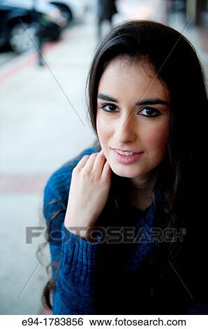 Portrait of a 21 year old brunette woman looking direrctly at the camera View Large Photo Image Stock Photograph - Portrait of a 21 year old brunette woman looking direrctly at the camera. Fotosearch