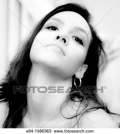 Portrait of a 24 year old brunette woman looking at the camera. View Large Photo Image Stock Image - Portrait of a 24 year old brunette woman looking at the camera.. Fotosearch