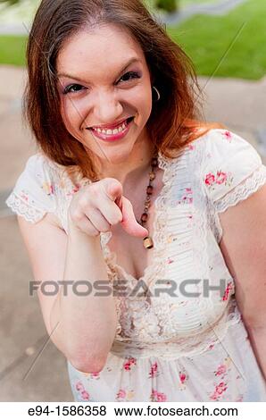 Portrait of a 24 year old brunette woman laughing at the camera View Large Photo Image Stock Photo - Portrait of a 24 year old brunette woman laughing at the camera. Fotosearch