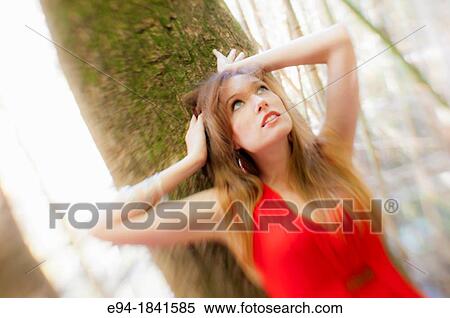 Portrait of a 30 year old redheaded woman outdoors View Large Photo Image Stock Photography - Portrait of a 30 year old redheaded woman outdoors. Fotosearch