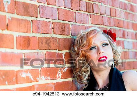 Portrait of a 34 year old blond woman looking away from the camera. View Large Photo Image Stock Image - Portrait of a 34 year old blond woman looking away from the camera.. Fotosearch