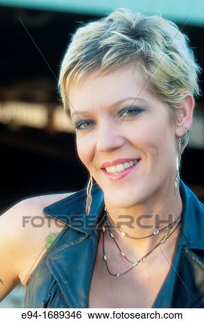 Portrait of a 41 year old blond woman smiling at the camera View Large Photo Image Stock Photograph - Portrait of a 41 year old blond woman smiling at the camera. Fotosearch