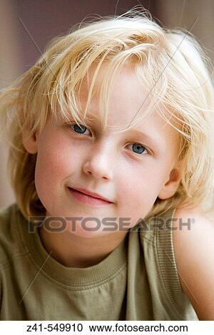 Portrait of a 7 year old boy. View Large Photo Image Stock Image - Portrait of a 7 year old boy.. Fotosearch