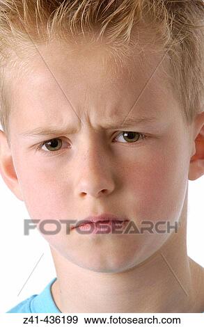 Stock Photo - Portrait of a 8 year old boy. Fotosearch