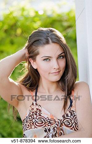 Portrait of a beautiful woman looking at camera View Large Photo Image Picture - Portrait of a beautiful woman looking at camera. Fotosearch