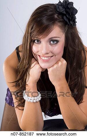 Portrait of a beautiful young girl View Large Photo Image Stock Photo - Portrait of a beautiful young girl. Fotosearch