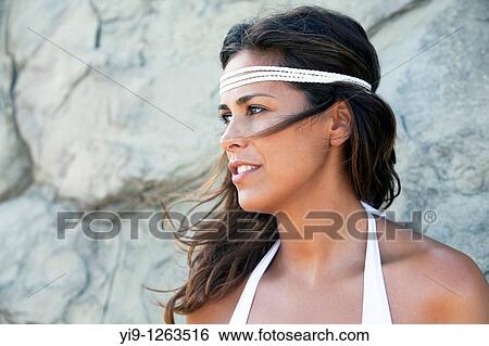 Portrait of a beautiful young woman View Large Photo Image Stock Photograph - Portrait of a beautiful young woman. Fotosearch