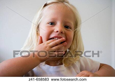 Portrait of a blond little girl View Large Photo Image Stock Image - Portrait of a blond little girl. Fotosearch