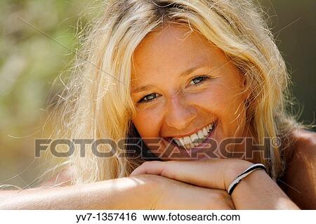 Stock Photograph - Portrait of a blonde woman. Fotosearch