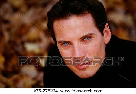 Portrait of a blue-eyed man View Large Photo Image Picture - Portrait of a blue-eyed man. Fotosearch