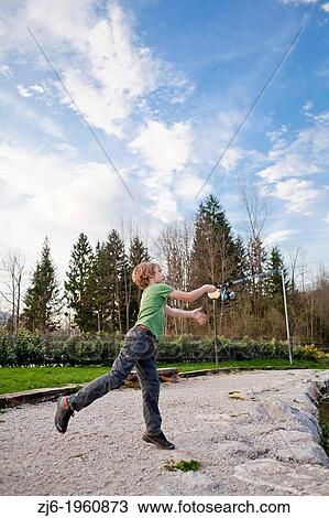Portrait of a boy fishing trouts in the lake. Slovenia. View Large Photo Image Stock Image - Portrait of a boy fishing trouts in the lake. Slovenia.. Fotosearch