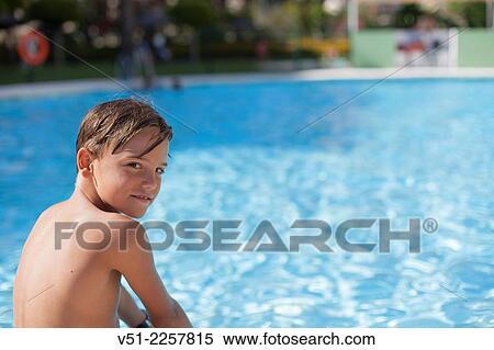 Portrait of a boy in a swimming pool View Large Photo Image Stock Photography - Portrait of a boy in a swimming pool. Fotosearch