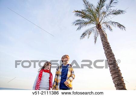 Portrait of a brother and his sister at the beach View Large Photo Image Stock Photograph - Portrait of a brother and his sister at the beach. Fotosearch