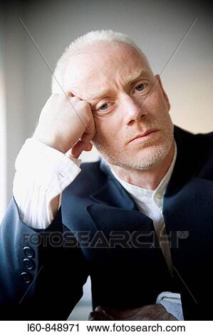Portrait of a businessman thinking View Large Photo Image Stock Image - Portrait of a businessman thinking. Fotosearch