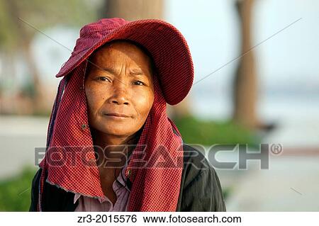 Portrait of a Cambodian woman along Mekong River early in the morning in Phnom Penh, Cambodia. View Large Photo Image Stock Photograph - Portrait of a Cambodian woman along Mekong River early in the morning in Phnom Penh, Cambodia.. Fotosearch