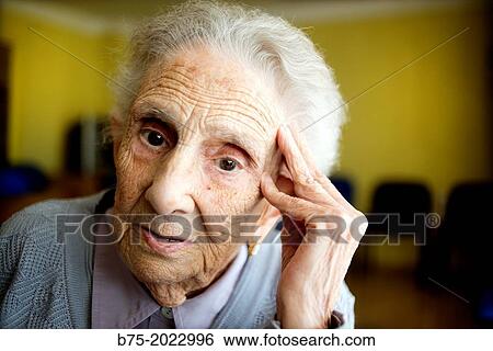 Portrait of a centennial woman in a elderly people home. View Large Photo Image Stock Photograph - Portrait of a centennial woman in a elderly people home.. Fotosearch
