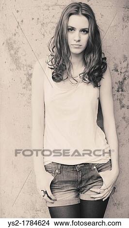 Portrait of a confident young woman View Large Photo Image Picture - Portrait of a confident young woman. Fotosearch