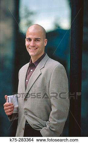 Picture - portrait of a contemporary young businessman. Fotosearch