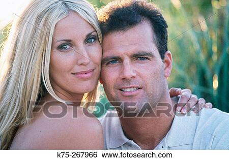 Stock Photograph - Portrait of a couple on vacation. Fotosearch