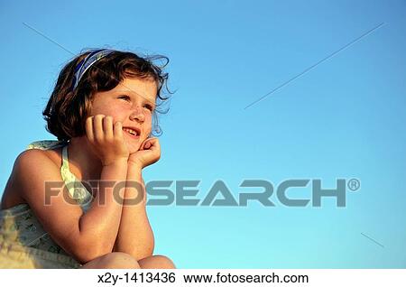 Portrait of a cute little girl, View Large Photo Image Stock Photograph - Portrait of a cute little girl,. Fotosearch