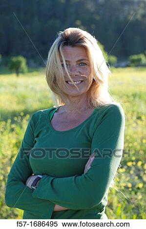 Portrait of a forty something year old woman View Large Photo Image Stock Photography - Portrait of a forty something year old woman. Fotosearch