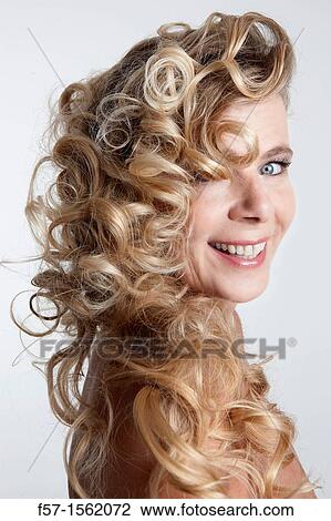 Stock Image - Portrait of a forty year old woman. Fotosearch