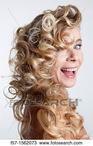 Stock Image - Portrait of a forty year old woman. Fotosearch