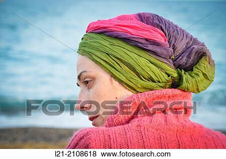 Portrait of a forty years old woman on a beach. View Large Photo Image Stock Photo - Portrait of a forty years old woman on a beach.. Fotosearch