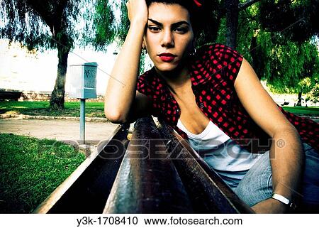 Portrait of a girl in a park. View Large Photo Image Stock Image - Portrait of a girl in a park.. Fotosearch